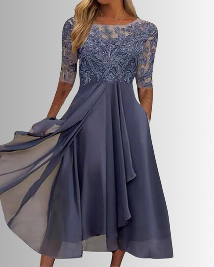Stylish dark grey boat neck midi dress for women, featuring a lace-detailed bodice, sheer elbow-length sleeves, and a flowing chiffon skirt with practical pockets, great for wedding events.