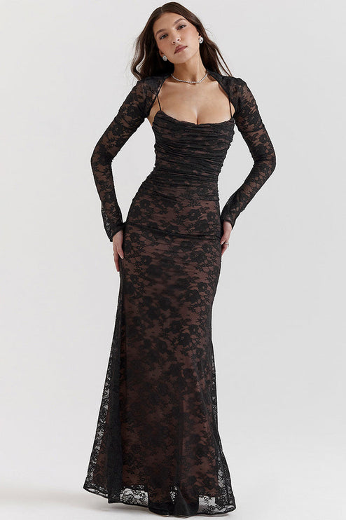 Black lace corset back strapless maxi dress with long sleeve bolero, ruched bodice, and floral lace overlay.