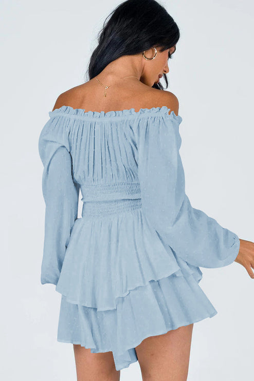 Back view of light blue off-shoulder mini dress, showcasing shirred back and tiered ruffles