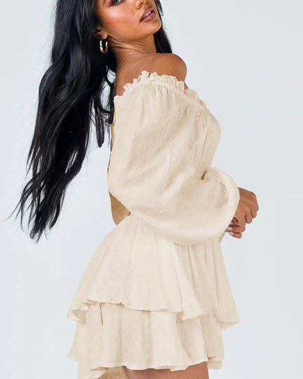 Side profile of a women's cream off-shoulder mini dress, highlighting the long balloon sleeves and ruffled hem.