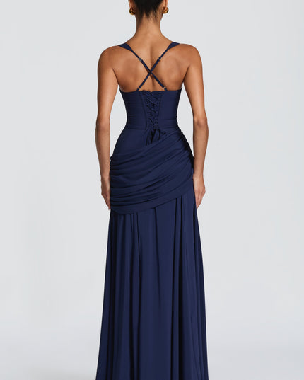 Back view of navy satin maxi dress with crisscross straps and lace-up corset detail