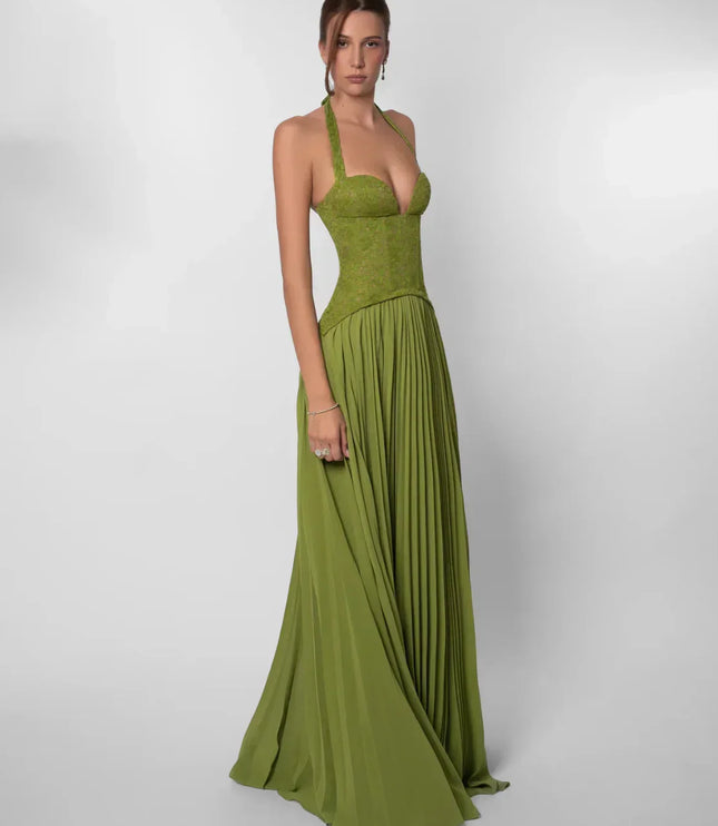 Three-quarter side view olive halter lace maxi dress showing fitted corset bodice and flowy skirt