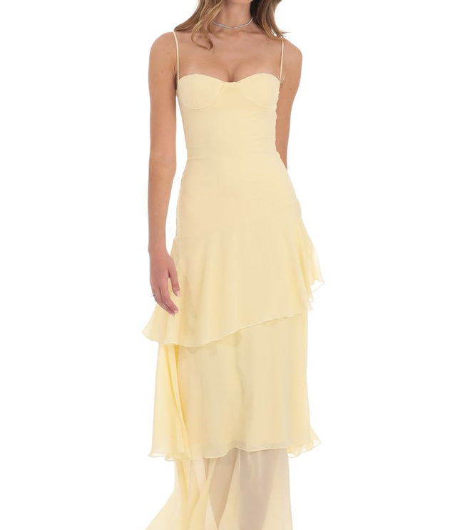 Pale yellow corset ruffled maxi dress with spaghetti straps and tiered skirt, front view
