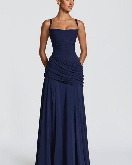 Pale yellow satin maxi dress with square neckline and full-length skirt, front studio view