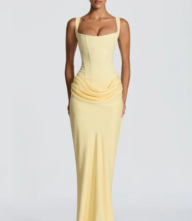 Pale yellow square neck corset maxi dress with fitted bodice and draped skirt, front view