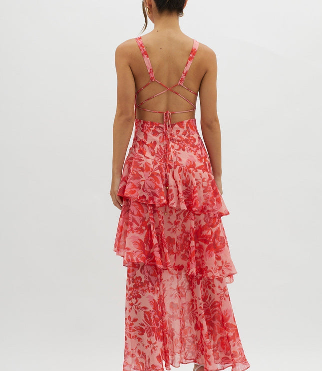 Pink floral ruffled maxi dress back view with open back and crisscross tie straps