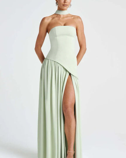 Sage green halter maxi dress showing the strapless bodice and high slit from the front