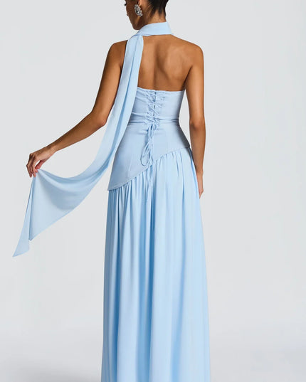 Back view of sky blue halter maxi dress with lace-up corset back and flowing scarf tie